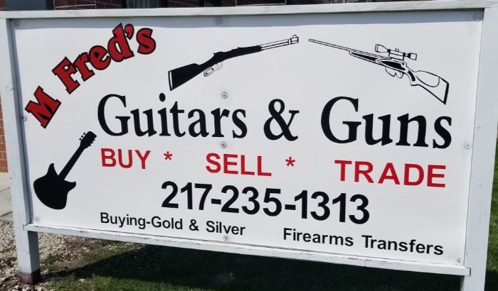 M Fred's Guns & Guitars
